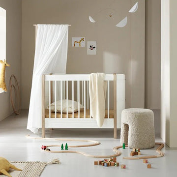 Wood Mini+ cot bed incl. junior kit, white/oak - Le Petit Marché Home Furniture