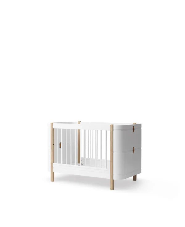 Wood Mini+ cot bed incl. junior kit, white/oak - Le Petit Marché Home Furniture