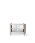 Wood Mini+ cot bed incl. junior kit, white/oak - Le Petit Marché Home Furniture