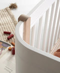 Wood Mini+ cot bed incl. junior kit, white/oak - Le Petit Marché Home Furniture